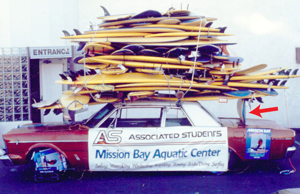 Word Record Surfboards stacked on a car